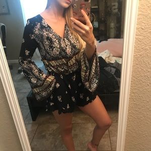 Floral romper with pockets!